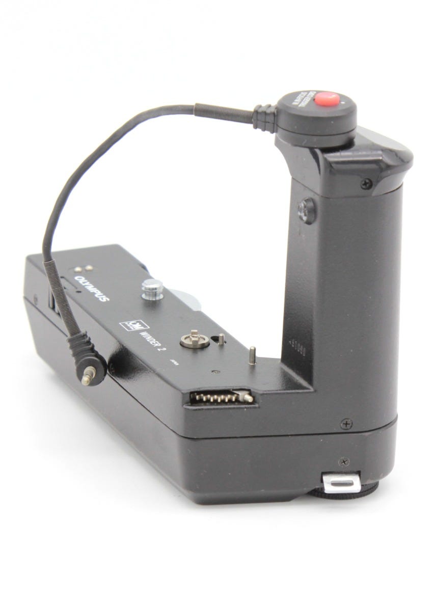 Used Olympus OM Winder 2 SN:491060 with Focus Trigger Cord