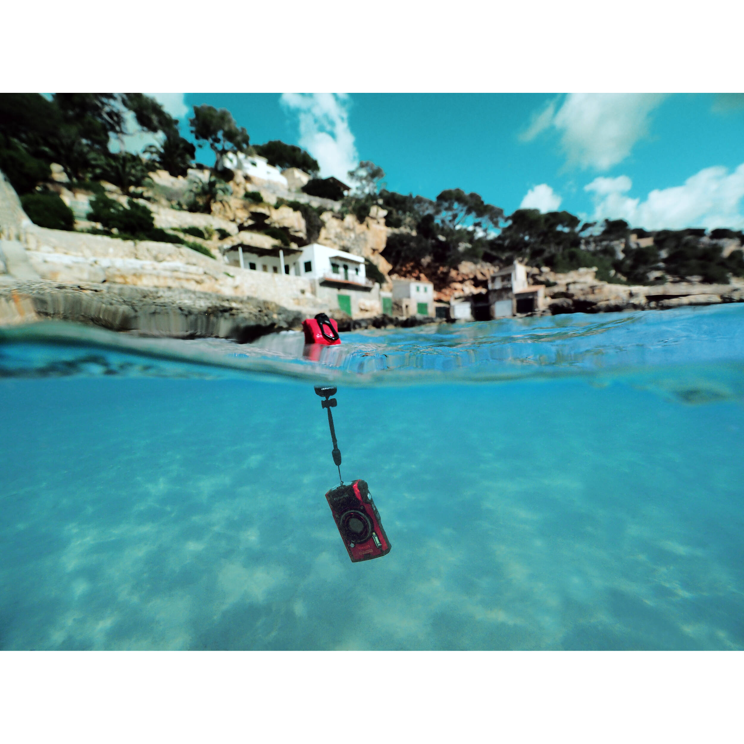OM System CHS-09 Floating Strap Red