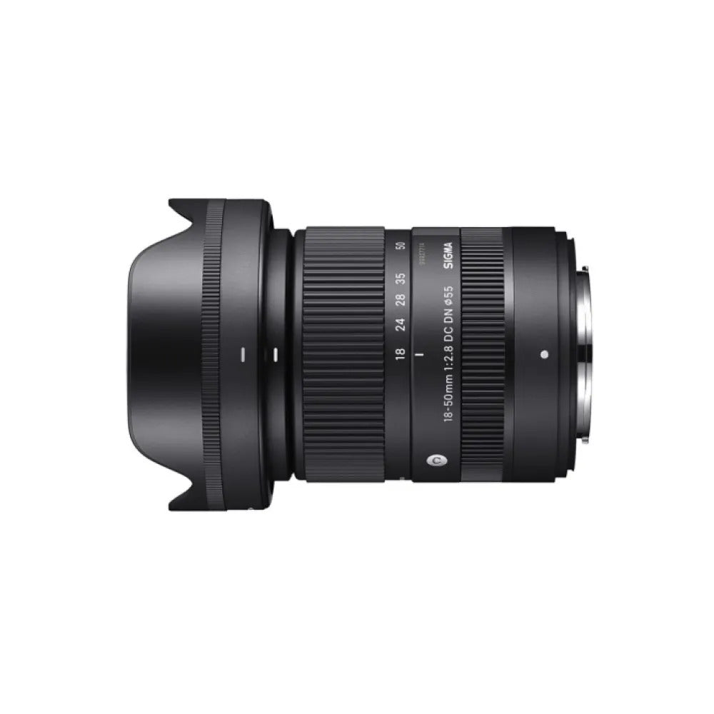 FUJIFILM X-E5 Silver with Sigma 18-50mm f/2.8 DC DN