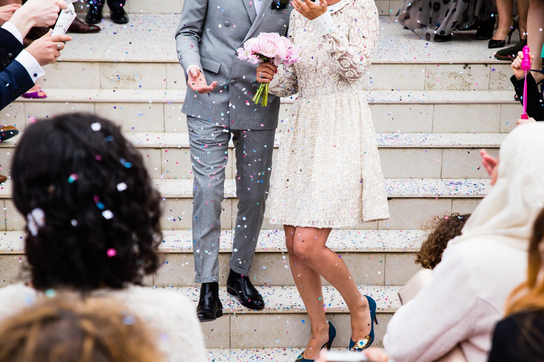 Wedding throwing confetti