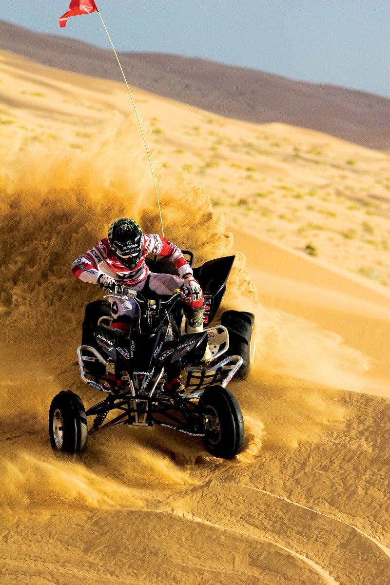 Quad bike on sand dune