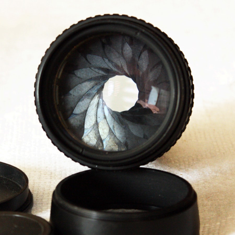 Aperture blades on a lens