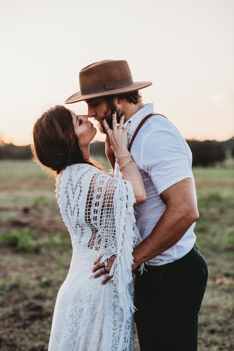 Bride & Groom kissing outdoors