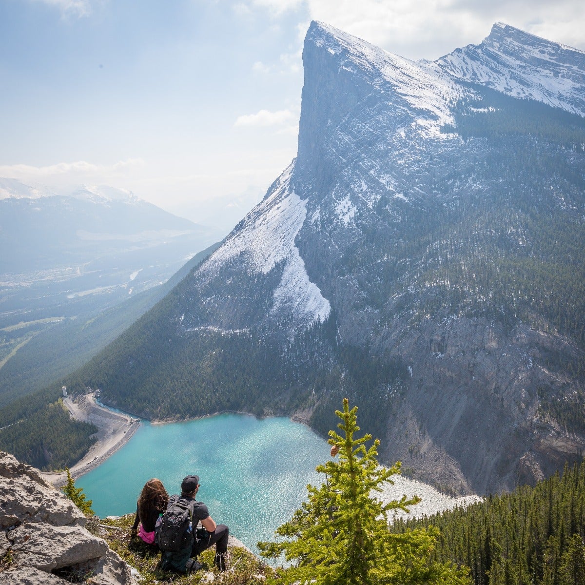 Man sitting in front of mountain view