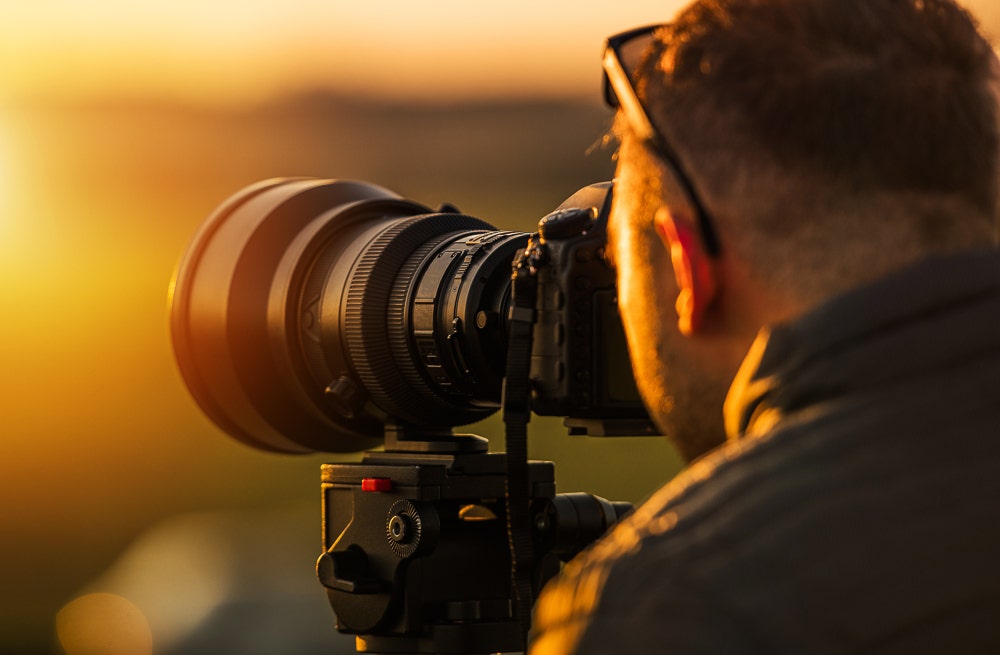 Telephoto lens on a tripod